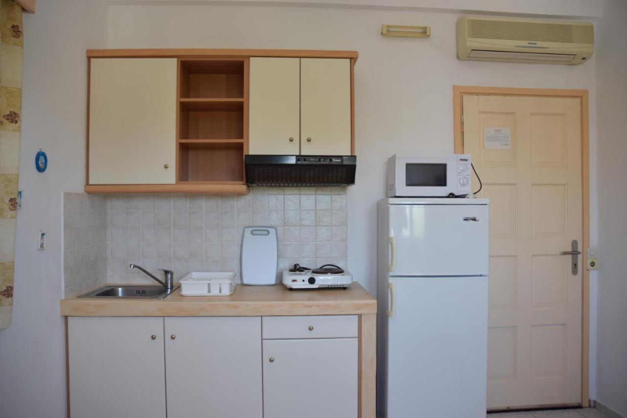Aparthotel Porto Apergis à Agios Ioannis  Extérieur photo