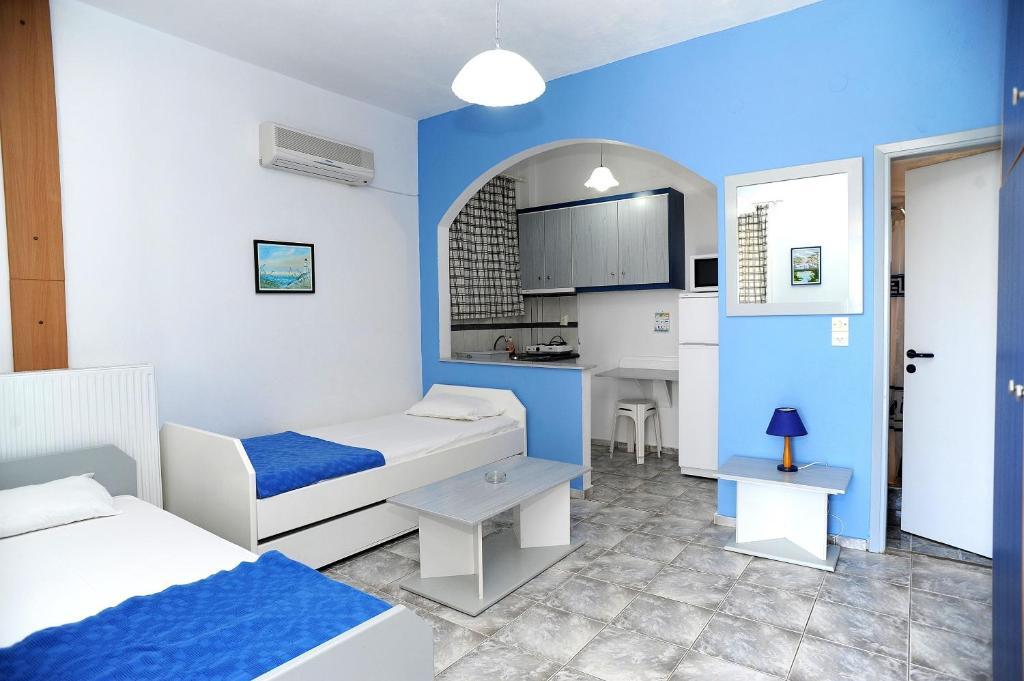 Aparthotel Porto Apergis à Agios Ioannis  Chambre photo